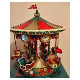 Holiday in Motion Revolving Lodge & Holiday Fair Carousel