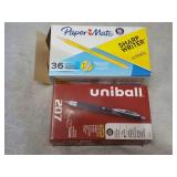 Paper Mat and Uniball Pens...