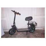 NEW Electric Scooter. w/lock & charger, extra inner tube for tire. 12" tires