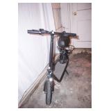 NEW Electric Scooter. w/lock & charger, extra inner tube for tire. 12" tires