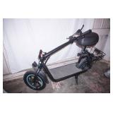 NEW Electric Scooter. w/lock & charger, extra inner tube for tire. 12" tires