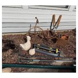Ceramic Bird Statues & Rusty Garden Tools