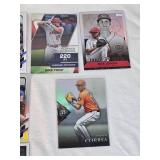 Lot of 27 Baseball Cards Featuring Players like Mike Trout, Nolan Ryan, and Derek Jeter with Various Sets and Rookie Cards.