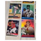 Lot of 27 Baseball Cards Featuring Players like Mike Trout, Nolan Ryan, and Derek Jeter with Various Sets and Rookie Cards.