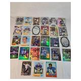 Lot of 27 Minnesota Vikings Football Cards featuring players like Alan Page, Warren Moon, Justin Jefferson, and Adrian Peterson. Includes Rookie, Holo, and Vintage cards.