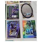 Lot of 27 Minnesota Vikings Football Cards featuring players like Alan Page, Warren Moon, Justin Jefferson, and Adrian Peterson. Includes Rookie, Holo, and Vintage cards.