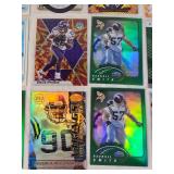 Lot of 27 Minnesota Vikings Football Cards featuring players like Alan Page, Warren Moon, Justin Jefferson, and Adrian Peterson. Includes Rookie, Holo, and Vintage cards.