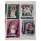Lot of 13 Minnesota Timberwolves Basketball Cards featuring players like Anthony Edwards, Rudy Gobert, and Jaden McDaniels. Includes Rookie, Holo, and Special Edition cards such as "Deep Space" and "E