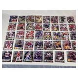 Lot of 39 1st Bowman Football Cards featuring various players including Deontae Lawson, Francisco Mauigoa