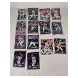 Lot of 14 Baseball Rookie Cards Featuring Adley Rutschman, Evan Carter, and Colton Cowser. Includes various brands with special features like holographic and holiday designs.