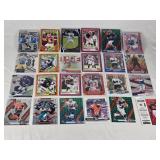 Lot of 24 Inserts and Relic Football Cards Featuring Players Like Lamar Jackson, Justin Herbert, and Trevor Lawrence. Includes Rookie Cards and Special Inserts.