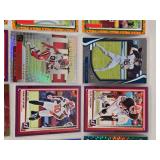 Lot of 24 Inserts and Relic Football Cards Featuring Players Like Lamar Jackson, Justin Herbert, and Trevor Lawrence. Includes Rookie Cards and Special Inserts.