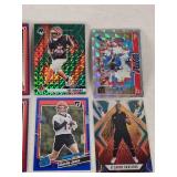 Lot of 24 Inserts and Relic Football Cards Featuring Players Like Lamar Jackson, Justin Herbert, and Trevor Lawrence. Includes Rookie Cards and Special Inserts.