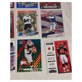 Lot of 24 Inserts and Relic Football Cards Featuring Players Like Lamar Jackson, Justin Herbert, and Trevor Lawrence. Includes Rookie Cards and Special Inserts.
