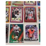 Lot of 24 Inserts and Relic Football Cards Featuring Players Like Lamar Jackson, Justin Herbert, and Trevor Lawrence. Includes Rookie Cards and Special Inserts.