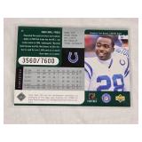 Lot of 4 Numbered Football Cards Featuring Kurt Warner, Marshall Faulk, Devery Henderson, and Patrick Willis