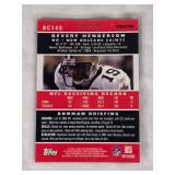 Lot of 4 Numbered Football Cards Featuring Kurt Warner, Marshall Faulk, Devery Henderson, and Patrick Willis