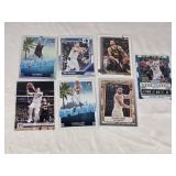 Lot of 7 Basketball Cards Featuring Luka Doncic, Stephen Curry, and Lonzo Ball