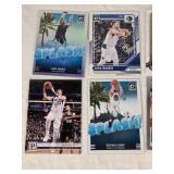 Lot of 7 Basketball Cards Featuring Luka Doncic, Stephen Curry, and Lonzo Ball
