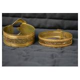 (2) metal bracelets...