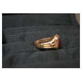 Ladies rings, one with red stone is...