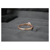 Ladies rings, one with red stone is...