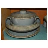 Stoneware dishes with extra pcs...
