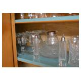 Clear glass bowls, glasses, salt an...