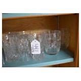 Clear glass bowls, glasses, salt an...