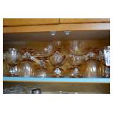 Stemware, various sizes. Light ambe...