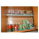 Christmas dishes in both cupboards...