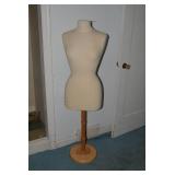 Mannequin on wood base...