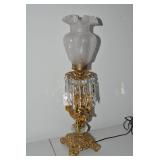 Brass electric lamp with cherub fig...