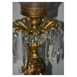Brass electric lamp with cherub fig...