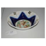 Cobalt blue porcelain bowl with sce...