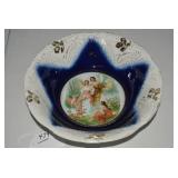 Cobalt blue porcelain bowl with sce...