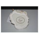 James MoorFine porcelain lady...