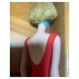 Barbie by Mattel; 64 on butt...