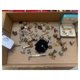 Cuff links and tie-tacks...