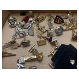 Cuff links and tie-tacks...