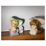 Head vase and doll head...