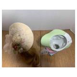 Head vase and doll head...