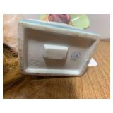 Head vase and doll head...