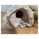 Head vase and doll head...