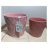 2 pink planters...