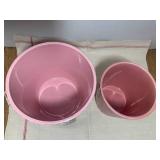 2 pink planters...