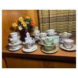 Red glass with cup and saucer colle...