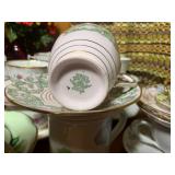 Red glass with cup and saucer colle...