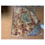 Photo album with moon shaped mirror...