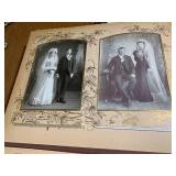 Photo album with moon shaped mirror...